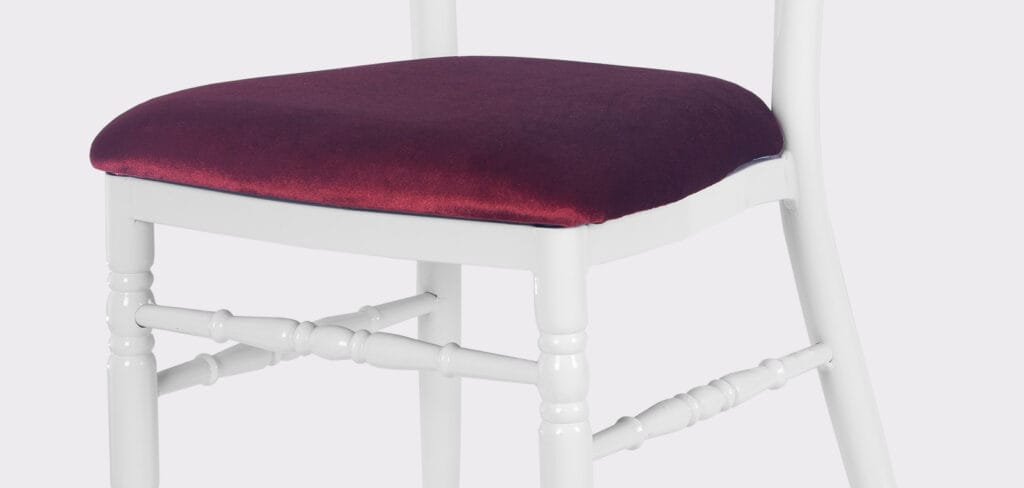 White Napoleon Chair with Red Seat Bag